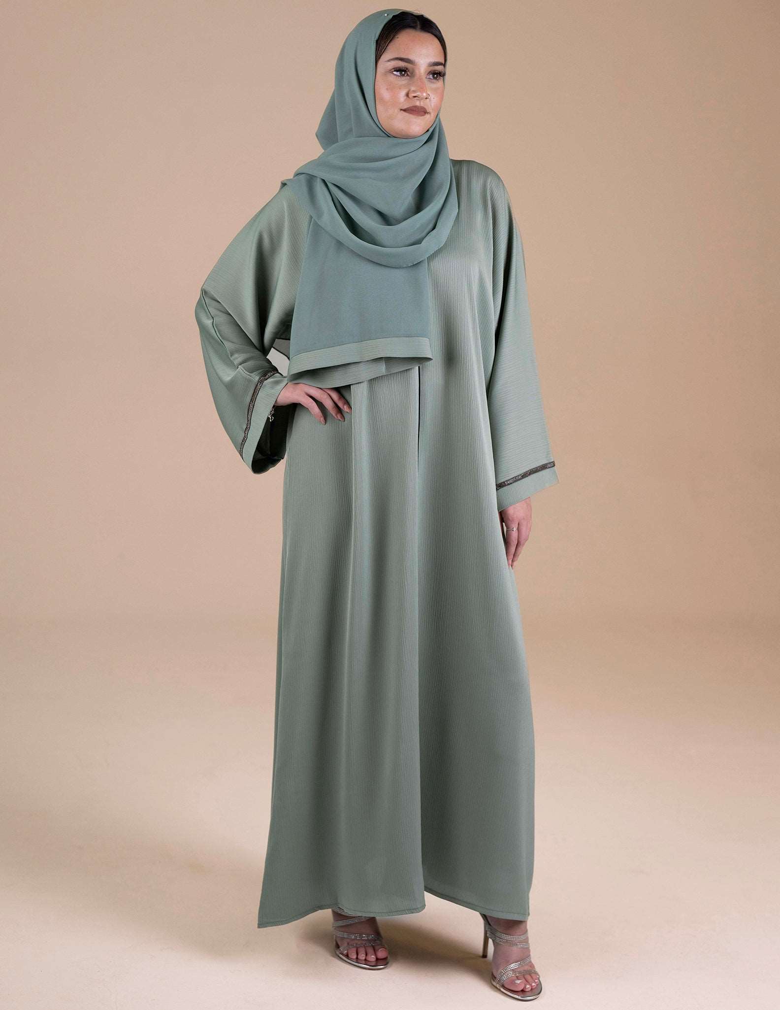 Mint Green Closed Abaya with Silver Sleeve Detail – AZAARYA