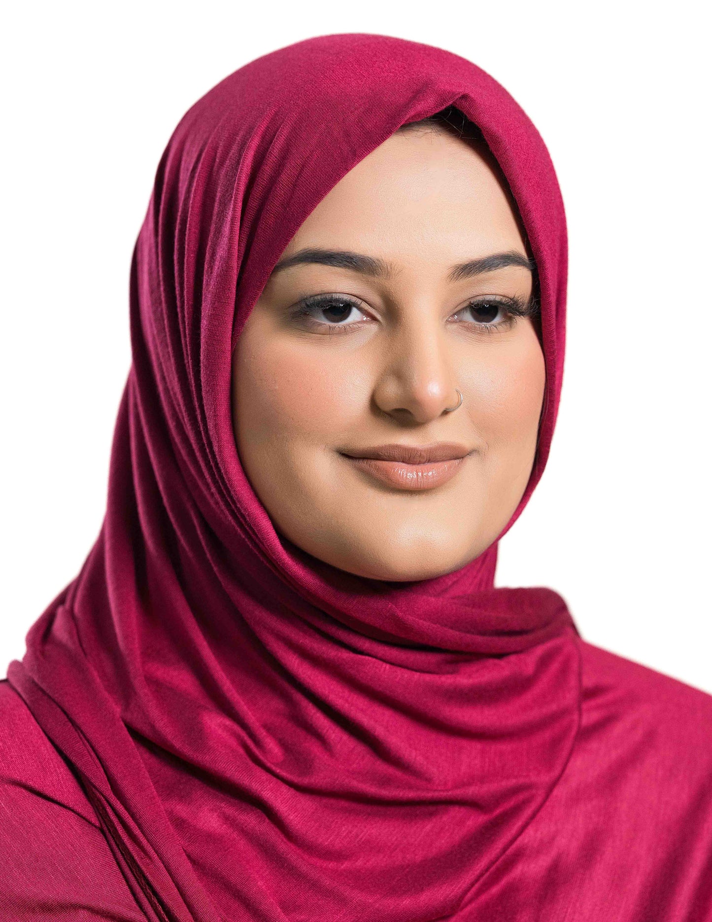 A woman wearing a deep red jersey hijab.
