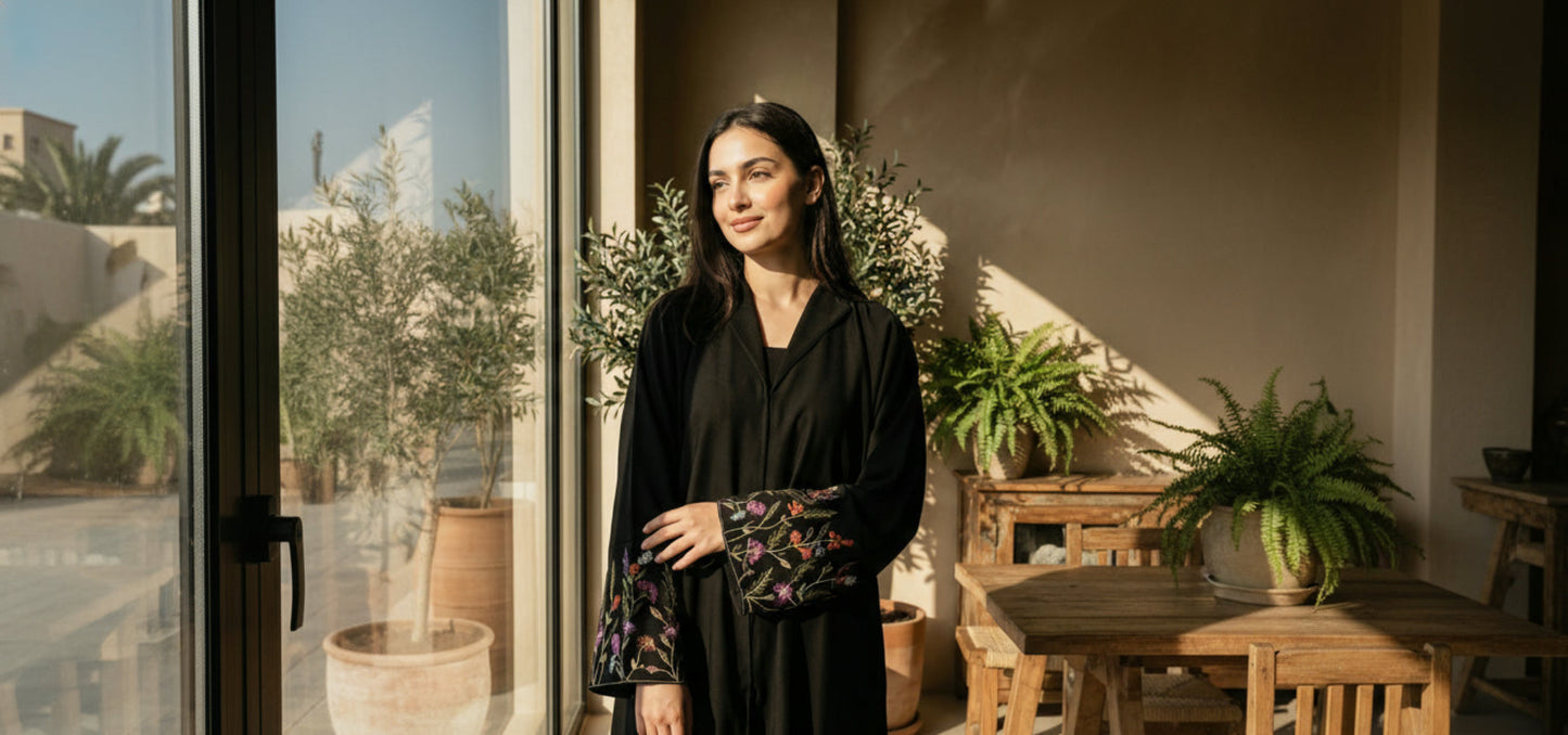 woman in black floral abaya ramadan
